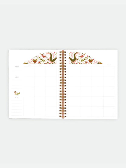 Uppslag ur månadskalender från ATWTS