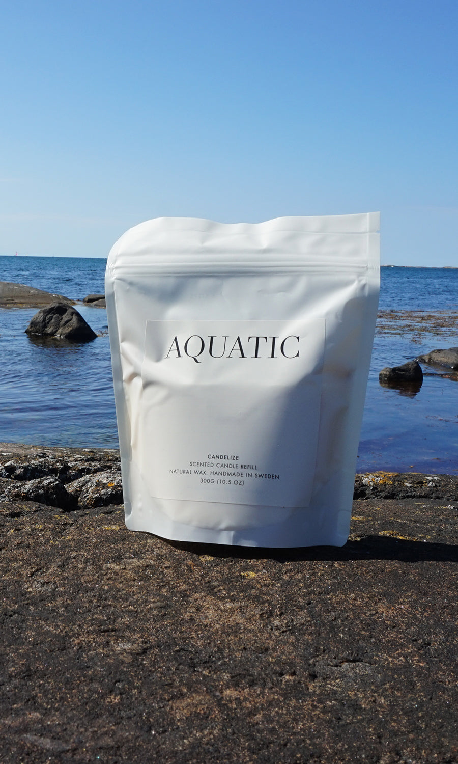 Candelize påfyllningspåse aquatic fotad vid hav