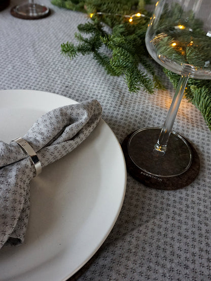 Glasunderlägg i kork i färgen smoked